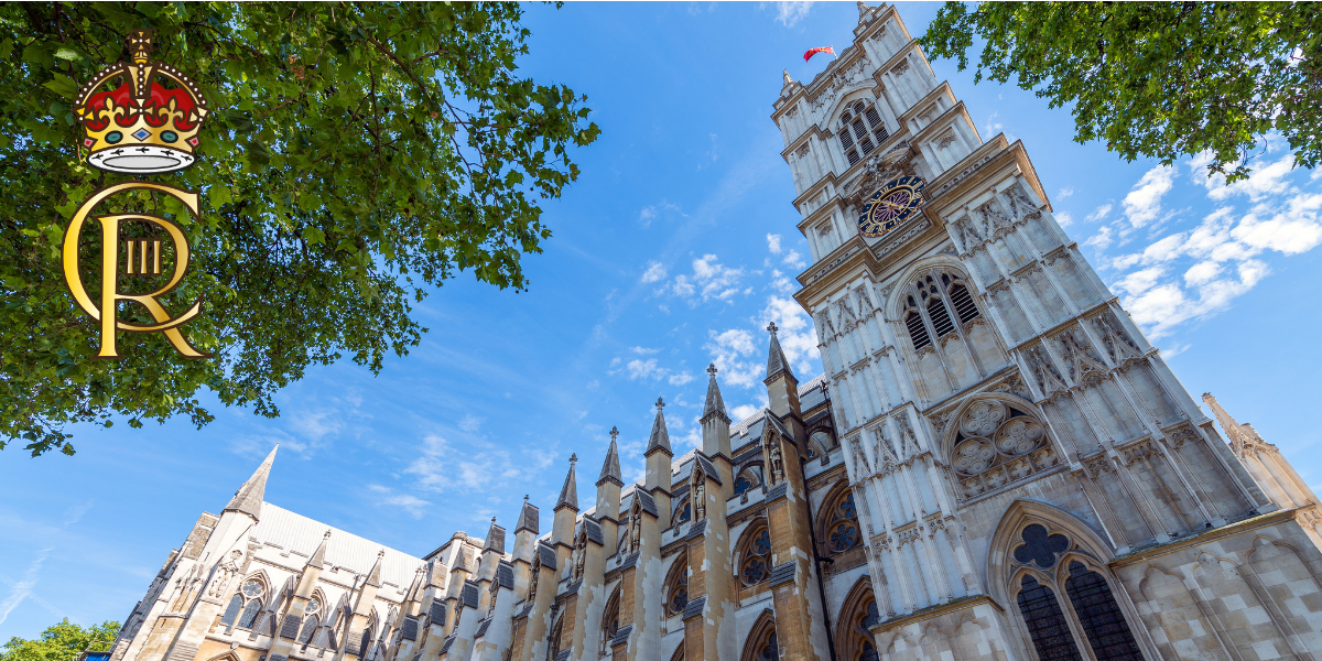 An image of Westminster Abbey with the Cypher of the King