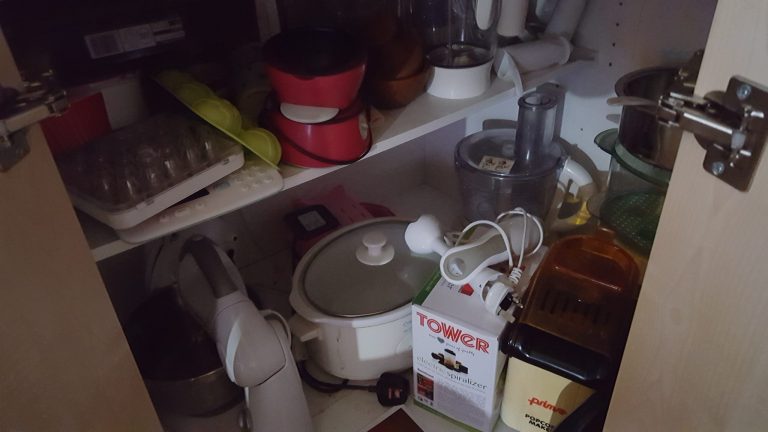 A messy Kitchen Cupboard