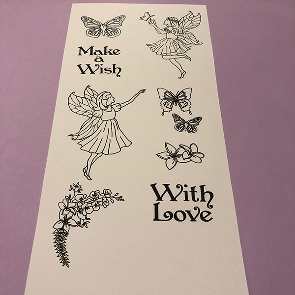 Living Creatively with Fibro | An image of the Dovecraft Fairy wishes stamps all stamped crystal clear in black ink