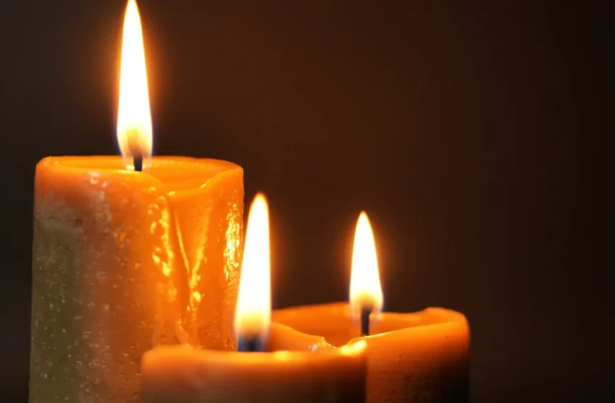 An image of candles in the darkness representing dealing with loss